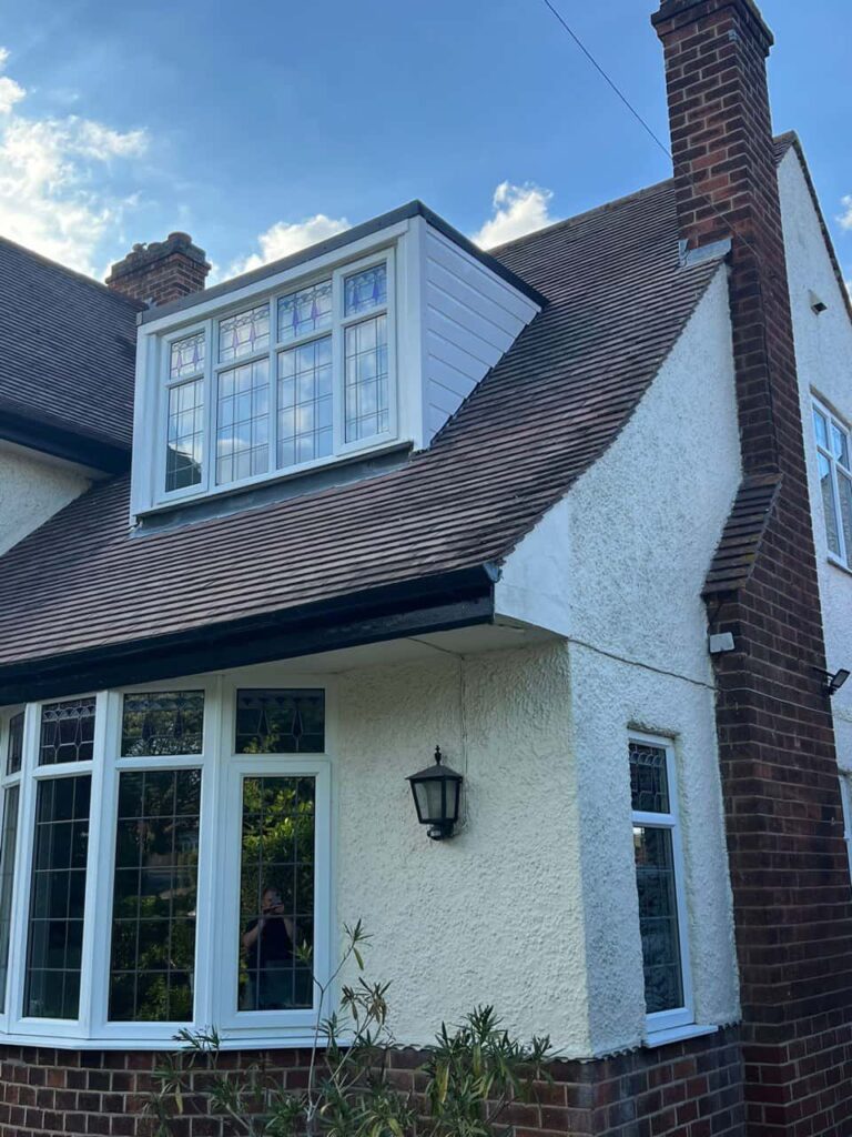 This is a photo of a dormer window which has just had some repairs carried out where the roof and the dormer meet. Works carried out by East Grinstead Roofing Repairs